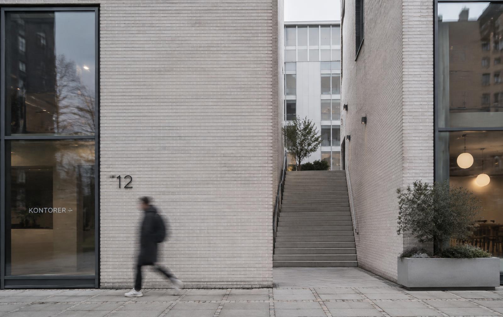 Pale brick facade of a Scandinavian city building